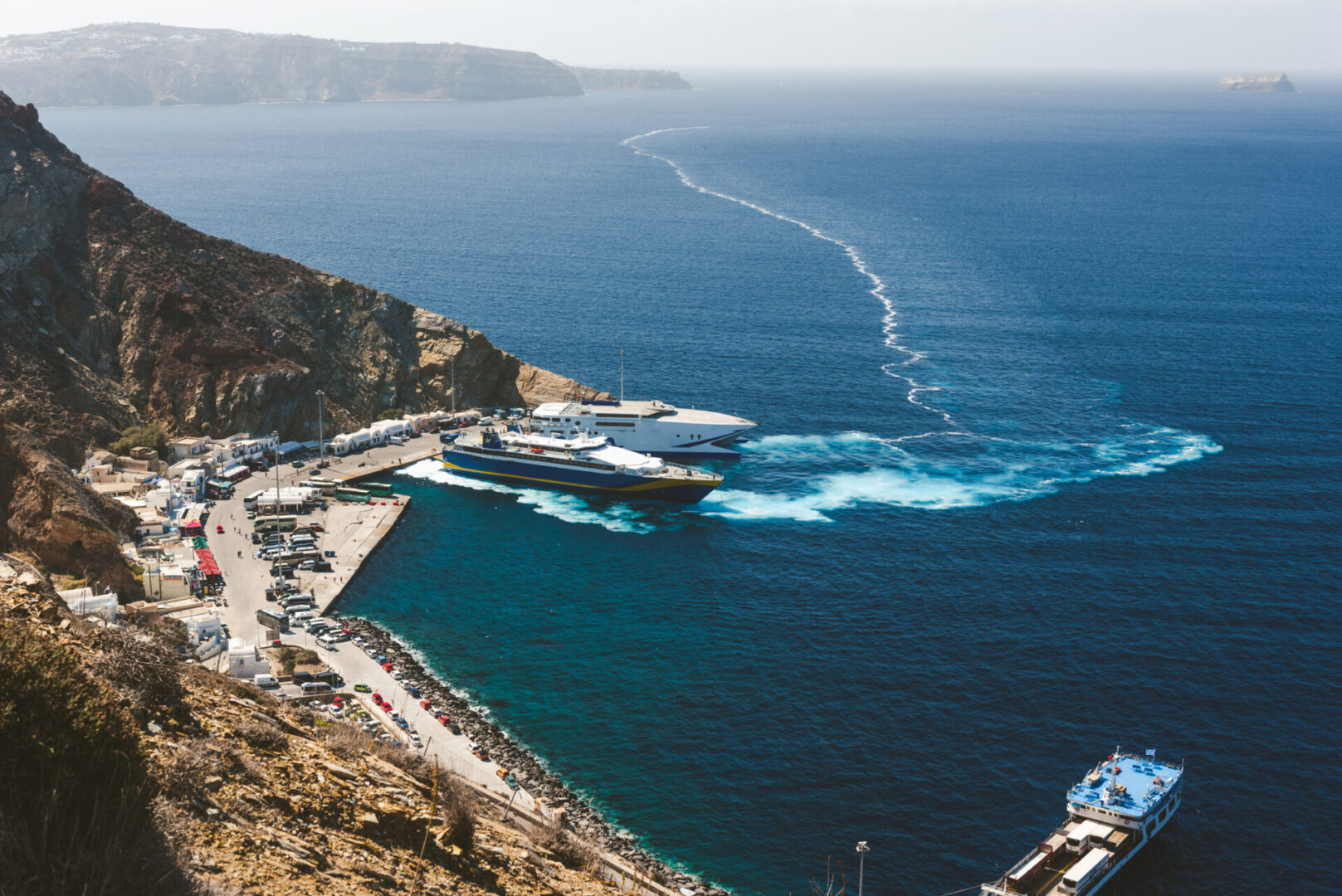 Scenic coastal view with boats and cliffs
